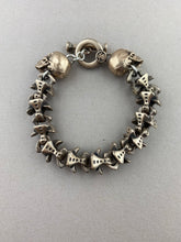Load image into Gallery viewer, Bronze Vertebrae bracelet w/ Skulls