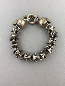 Bronze Vertebrae bracelet w/ Skulls