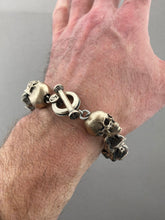 Load image into Gallery viewer, Bronze Vertebrae bracelet w/ Skulls