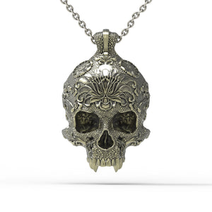 Colgante de calavera ornamental de bronce