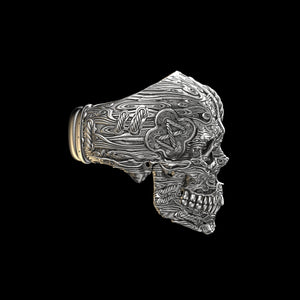 Anillo de calavera de viento atado de ley